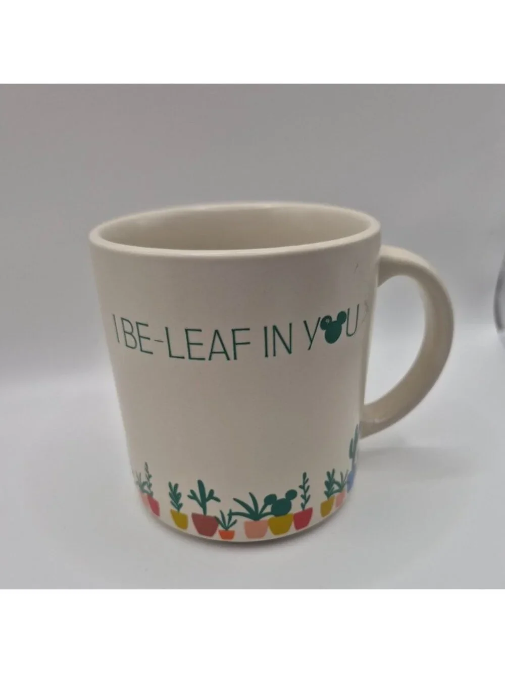 Disney Stoneware Mug 11 Oz I Be-Leaf In You With Colorful Plant Pot Design